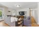 Cozy living room with sofas, TV, and display cabinets, creating an inviting atmosphere at 130 Atwell Rd, Mt Ulla, NC 28125