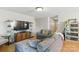 Inviting living room featuring TV with display cabinets and a comfortable seating area at 130 Atwell Rd, Mt Ulla, NC 28125