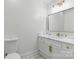 Bright bathroom with a modern sink vanity, updated toilet and ample natural light at 13833 Jonathans Ridge Rd, Mint Hill, NC 28227