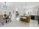 Bright eat-in kitchen with quartz countertops, wooden island, and modern appliances at 13833 Jonathans Ridge Rd, Mint Hill, NC 28227