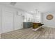 Nicely styled kitchenette with modern cabinets, pendant lights, and breakfast bar at 13833 Jonathans Ridge Rd, Mint Hill, NC 28227