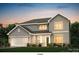 Charming two-story home with gray siding, a two-car garage, and professionally landscaped front yard at 1385 Coppergate Dr, Salisbury, NC 28147