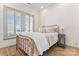 Comfortable bedroom with shuttered windows and neutral decor at 1447 Encore Ln, Waxhaw, NC 28173