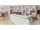 Open floor plan with a view of the kitchen, living room, and dining area at 1447 Encore Ln, Waxhaw, NC 28173
