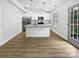 Spacious kitchen with modern stainless steel appliances, island, and natural light at 1638 Pineburr Ln, Rock Hill, SC 29730