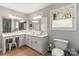 Bright bathroom with dual sinks, ample countertop space, and well-lit mirrors, offering comfort and functionality at 1657 Bowater Rd, Rock Hill, SC 29732