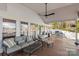 Spacious covered porch with seating, a ceiling fan, and access to the grill at 1657 Bowater Rd, Rock Hill, SC 29732