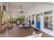 Spacious covered porch with seating, a ceiling fan, and access to the house at 1657 Bowater Rd, Rock Hill, SC 29732