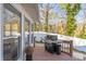 View of a grill on the exterior deck area with plenty of space and a white fenced-in yard at 1657 Bowater Rd, Rock Hill, SC 29732