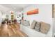 Hallway featuring a sitting bench, modern décor, and providing access to the dining and kitchen areas at 1657 Bowater Rd, Rock Hill, SC 29732