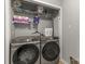 Convenient laundry closet with shelving, washer, and dryer set at 1657 Bowater Rd, Rock Hill, SC 29732