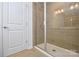 The updated bathroom features a glass-enclosed shower with tiled surround at 1814 Saint Louis Nw Aly, Concord, NC 28027