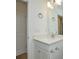 Well-lit bathroom with a white vanity, a quartz countertop and chrome fixtures at 1814 Saint Louis Nw Aly, Concord, NC 28027