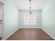 Bright dining area featuring tile flooring, neutral walls, and a modern light fixture at 1838 Summit Ridge Ln, Kannapolis, NC 28083