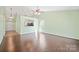Open living room with hardwood floors, recessed lighting and view of the kitchen at 1838 Summit Ridge Ln, Kannapolis, NC 28083