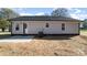 Exterior view of backyard featuring patio, lawn and home at 206 W 19Th St, Kannapolis, NC 28081