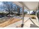 Inviting front porch view showcasing a spacious concrete porch and views of the neighborhood at 206 W 19Th St, Kannapolis, NC 28081