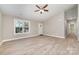 A bright living area with sleek floors and a view of the front entryway, blending modern style with comfort at 206 W 19Th St, Kannapolis, NC 28081