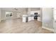 Open-concept space featuring a modern kitchen with stainless steel appliances seamlessly connected to a well-lit living area at 206 W 19Th St, Kannapolis, NC 28081