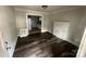 Bright living room featuring hardwood floors, a fireplace, and an open floor plan at 2312 Tate St, Charlotte, NC 28216