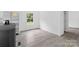 Open area showcasing the kitchen with stainless steel appliances and modern flooring at 253 Artemis Pl # 27, Kershaw, SC 29067
