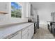 Bright kitchen showcasing stone countertops, stainless steel appliances, and modern cabinetry at 253 Artemis Pl # 27, Kershaw, SC 29067