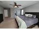 Spacious primary bedroom with a ceiling fan, neutral colors, and carpeted floors at 2741 Smethwick Ln, Gastonia, NC 28056