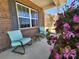 Cozy front porch with comfortable seating and charming plants, perfect for relaxing at 2741 Smethwick Ln, Gastonia, NC 28056