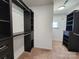 Walk-in closet with custom shelving at 2741 Smethwick Ln, Gastonia, NC 28056
