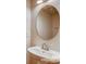 Charming powder room with a pedestal sink and stylish mirror at 319 Pond Place Ln, Matthews, NC 28104