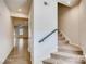 Inviting foyer with a staircase leading to the upper level, and hardwood flooring at 319 Pond Place Ln, Matthews, NC 28104