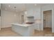 Bright kitchen featuring a large island, stainless steel appliances, and recessed lighting at 3200 Providence Rd # 1B, Charlotte, NC 28211