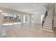 Spacious living room features sliding glass doors and an open floor plan at 3200 Providence Rd # 1B, Charlotte, NC 28211