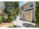 Backyard patio area with exterior door and mature tree at 321 Rose Garden Ct, Rock Hill, SC 29732
