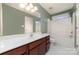 A bathroom featuring a long vanity counter and a shower-tub combo at 321 Rose Garden Ct, Rock Hill, SC 29732