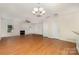Bright, airy living room featuring a cozy fireplace and seamlessly integrated dining space at 321 Rose Garden Ct, Rock Hill, SC 29732