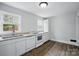 Clean kitchen with white cabinets and modern appliances at 3221 Cosby Pl, Charlotte, NC 28205