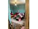 Spacious bedroom with a cozy chair and a large bed at 3260 Reepsville Rd, Lincolnton, NC 28092