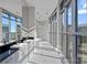 Modern bathroom with double sinks, a luxurious tub, glass shower and large windows at 333 W Trade St # 2704, Charlotte, NC 28202