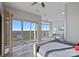 Open concept bedroom flows into the living room with beautiful views from the large sliding doors at 333 W Trade St # 2704, Charlotte, NC 28202