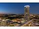 Stunning high-rise with panoramic city views at night at 333 W Trade St # 2704, Charlotte, NC 28202