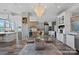 Bright dining area adjacent to kitchen features stylish seating and sophisticated decor at 333 W Trade St # 2704, Charlotte, NC 28202