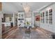 Elegant dining area with chic chandelier, and views of the spacious kitchen at 333 W Trade St # 2704, Charlotte, NC 28202
