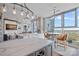 Bright open concept living space with large kitchen island and breakfast nook at 333 W Trade St # 2704, Charlotte, NC 28202