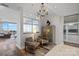 Elegant sitting area features stylish decor, a chandelier, and natural light at 333 W Trade St # 2704, Charlotte, NC 28202