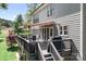 Outdoor deck features a BBQ grill, outdoor seating, and peaceful scenery to enjoy at 3934 Blue Dory Ln, Denver, NC 28037