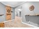 Finished basement featuring a dartboard and a decorative wood wall at 3934 Blue Dory Ln, Denver, NC 28037