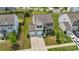 A top-down view of the home with a green and white exterior, a 2 car garage, and fresh landscaping at 4213 Stockbrook Dr, Charlotte, NC 28215