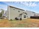 Large backyard and outdoor patio with grilling setup for entertaining at 4213 Stockbrook Dr, Charlotte, NC 28215