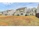 Spacious backyard showcasing the property's outdoor space and neighborhood views at 4213 Stockbrook Dr, Charlotte, NC 28215